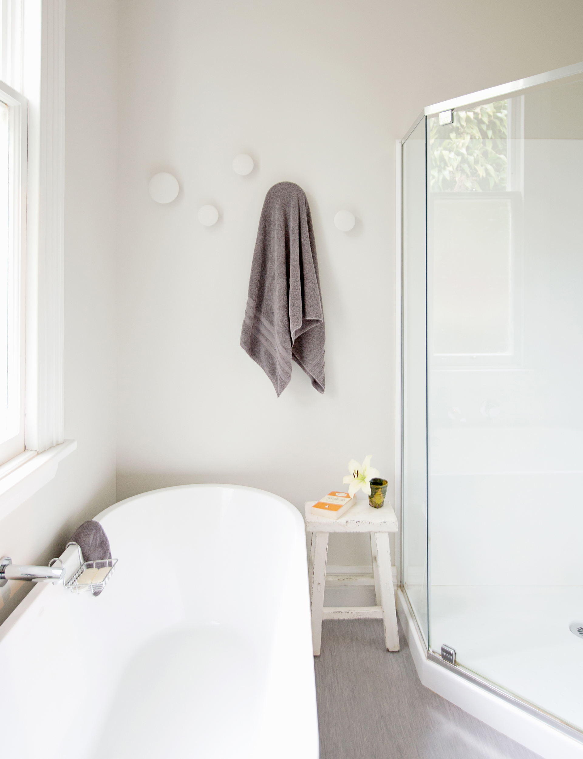 In the family bathroom white Muuto ‘Dots’ (handy for hanging towels) soften the look.