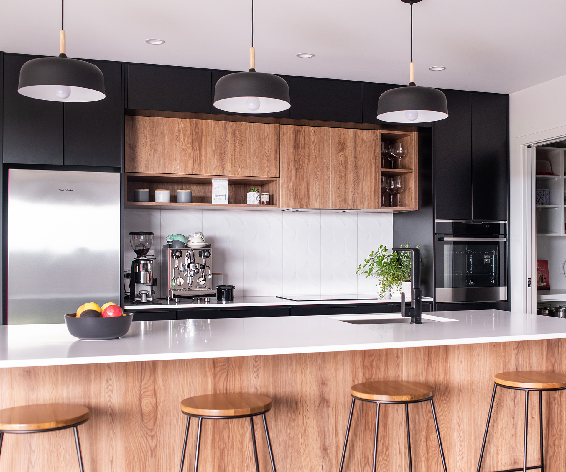 This black and white kitchen was designed for entertaining
